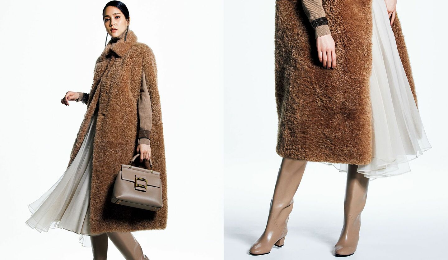 「ブルネロ クチネリ」の起毛素材コートを着用した女性