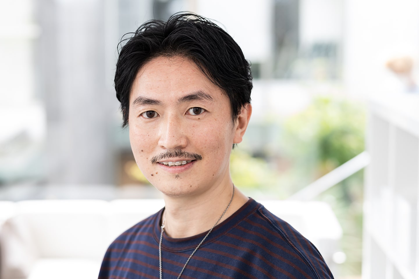 DIFINO aoyama店長・山口祐亮さん。料理の腕はプロ級。「週に2回は料理をつくります。最近では、あさりとトマトのリゾットは評判がよかったですね」