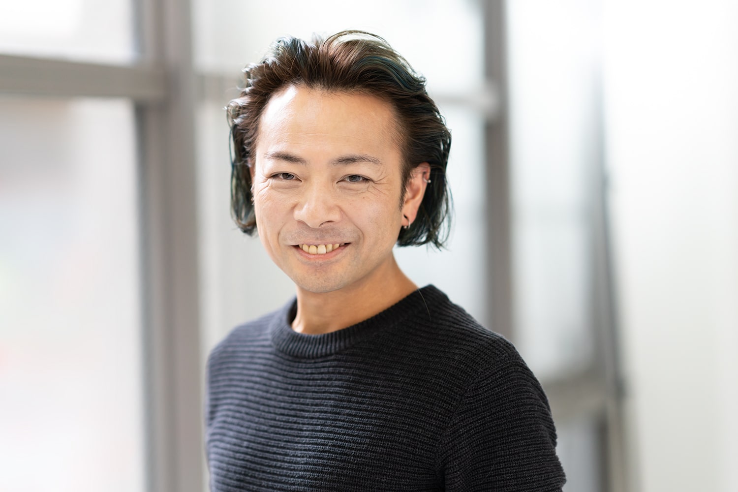 ACQUA aoyama ディレクター・伊藤和明さん。落語を聞くのが趣味で、年200回は寄席や落語会に通うほど。「今のイチオシは古今亭文菊さんです」
