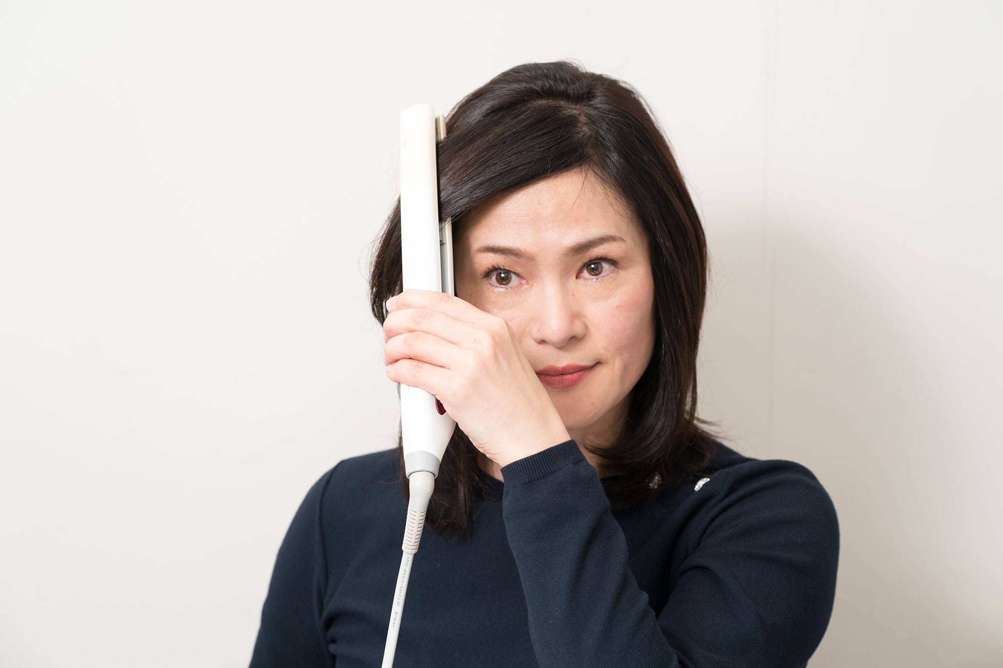 前髪を横に長し生え際が見えないように