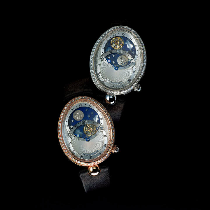 時計『クイーン・オブ・ネイプルズ デイ／ナイト 8998』［ケースサイズ縦40.05×横32㎜ サテンストラップ 自動巻き］ 上／￥13,420,000［ホワイトゴールド×ダイヤモンド］・下／￥13,310,000［ローズゴールド×ダイヤモンド］（ブレゲ ブティック銀座）