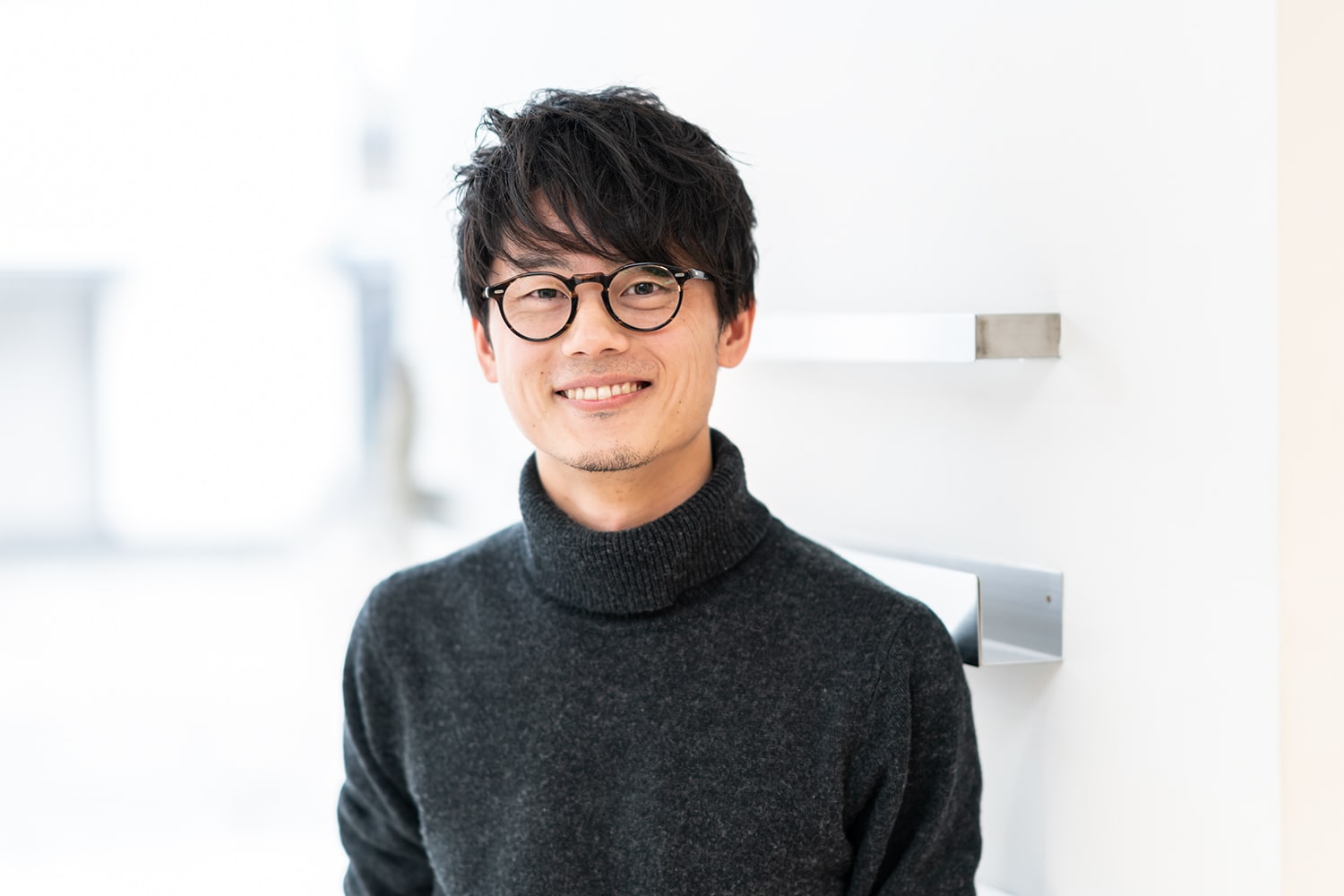 sui 副店長・ヘアデザイナー 中西雄二さん。昨年から始めたのがスケートボード。「友人に誘われて始めました。月1回のペースでしか練習できないので、なかなか上達しないですね」