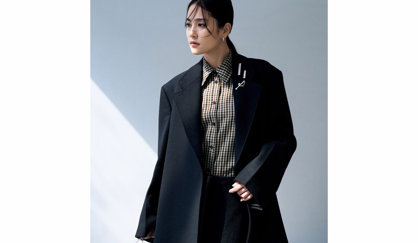 ジル サンダーのコートを着用したモデル