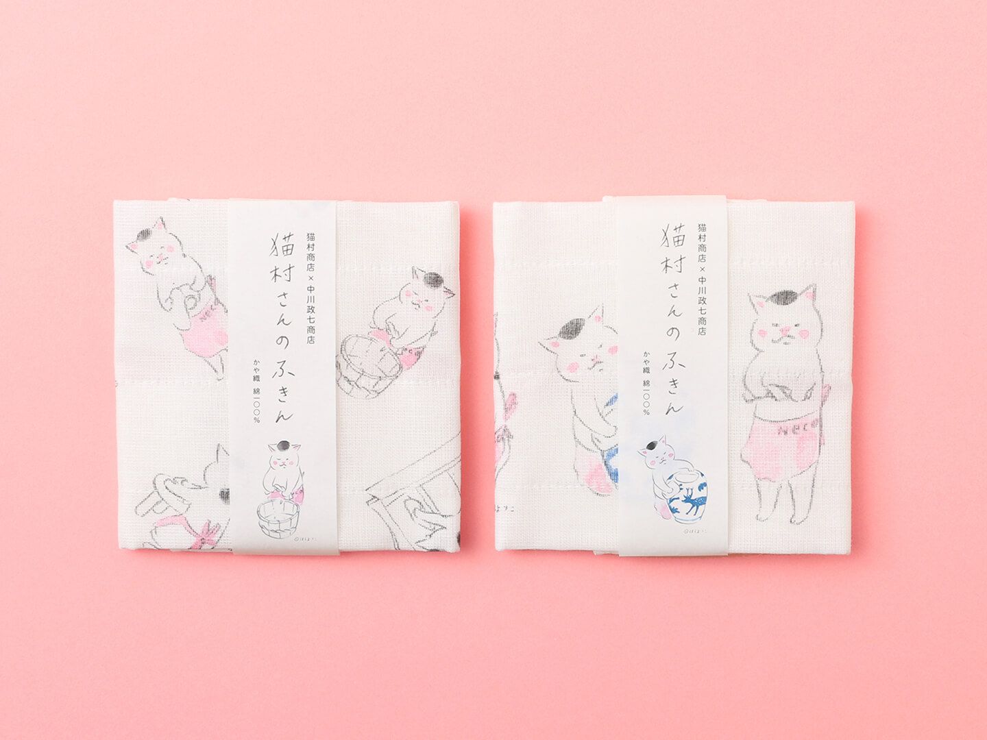 左/猫村さんのふきん お手入れいろいろ¥500【約30×40cm】・右/猫村さんのふきん 拭き掃除¥500【サイズ約30×40cm】