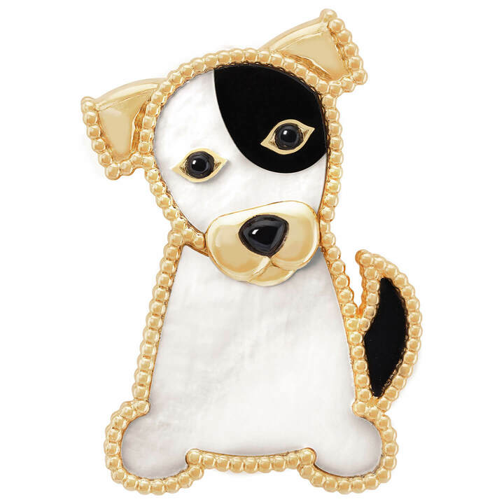 シアン クリップ￥705,000（税抜）[イエローゴールド、ホワイト マザーオブパール、オニキス ]