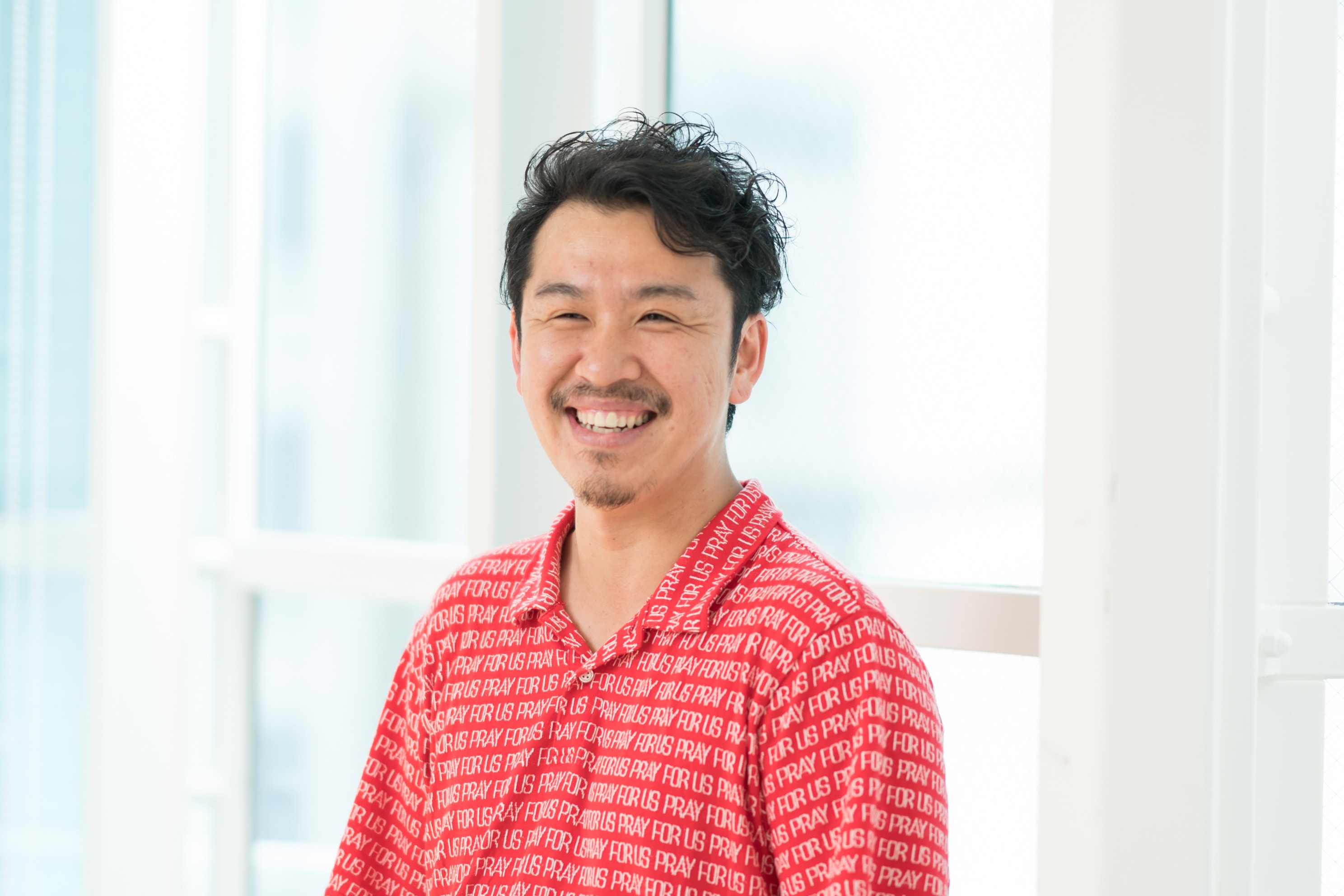 air-GINZA central 店長・高山大輔さん。コーヒーとパンが大好き。「パン好きの仲間と美味しいと評判のパン屋を巡って食べ比べをするパンツアーをしています」