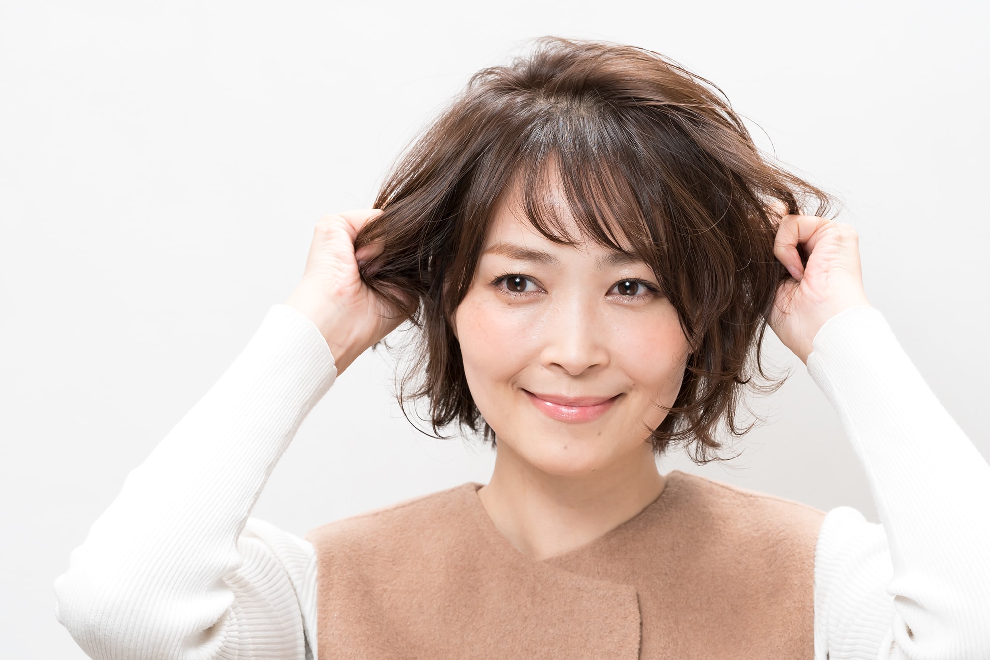 両手で握りながらちらしていく