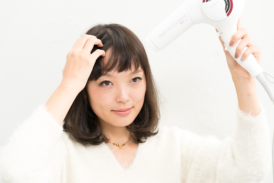 ドライヤーで引っ張りながら乾かす
