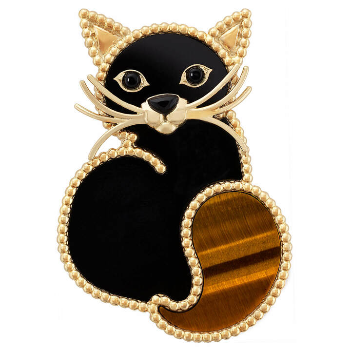 シャ クリップ￥640,000（税抜）[イエローゴールド、タイガーズアイ、オニキス]