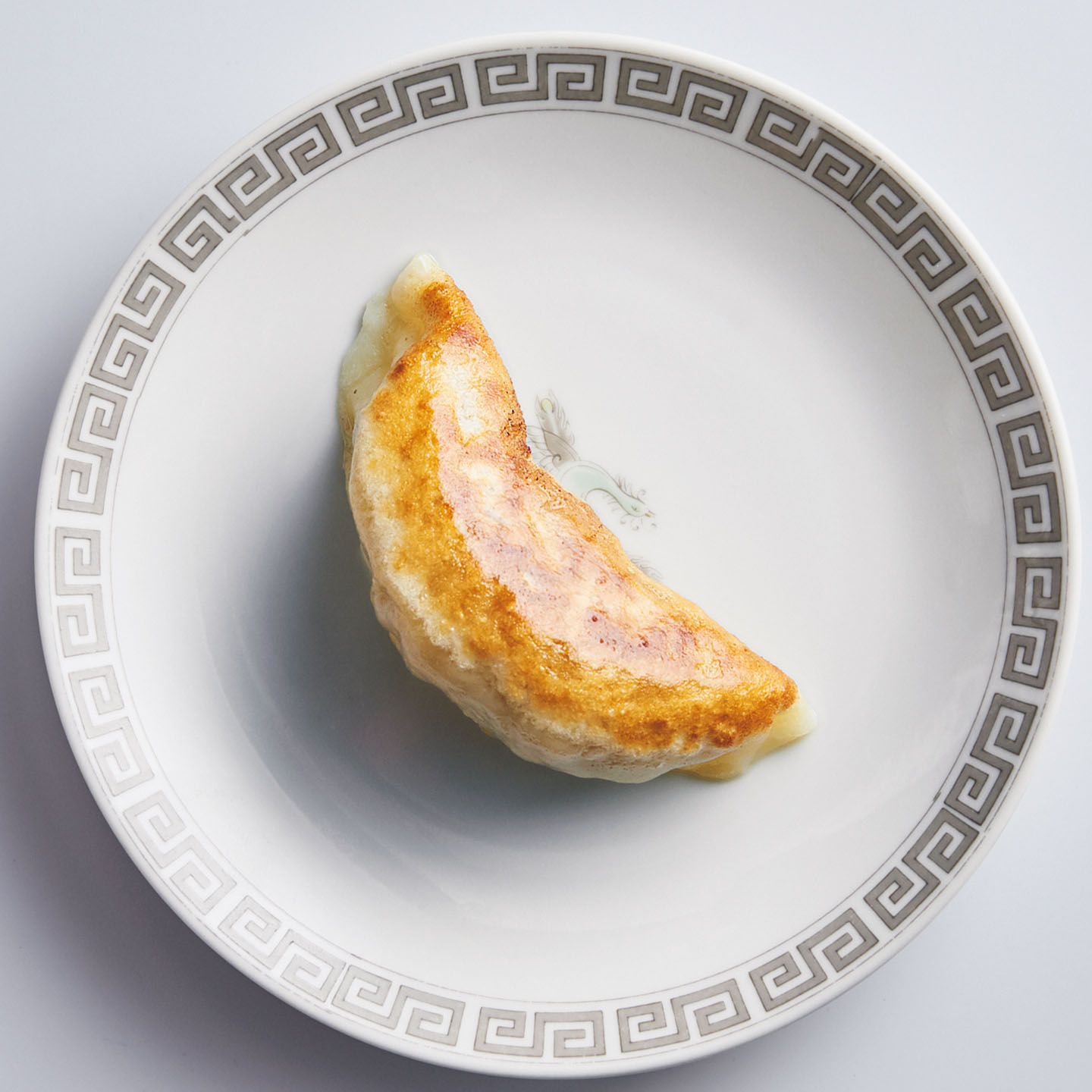 3rd dish/よだれ鶏のタレにつける餃子。2のタレを餃子に!