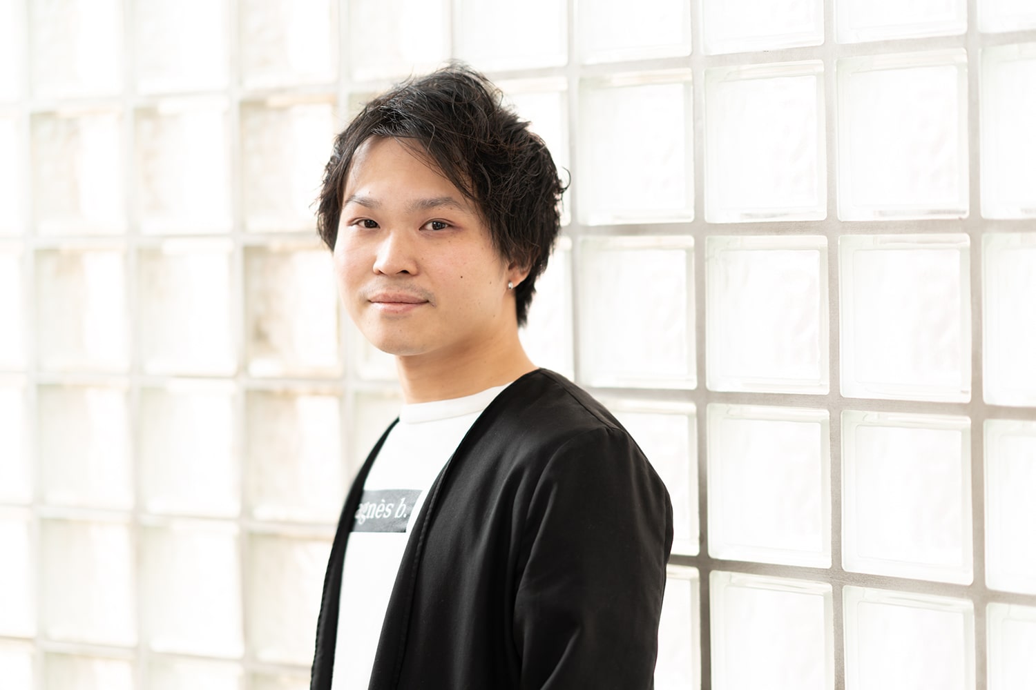 Ramie GINZA副店長・寺尾拓巳さん。最近、ボクシングにハマっていると言う寺尾さん。「目標はシックスパック!とまでは言いませんが、体力をつけるために続けたいですね(笑)」