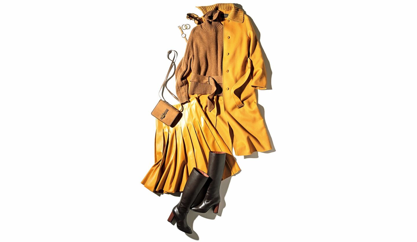 ロロ・ピアーナのコート・ニット・スカート・バッグを用いたコーディネートの写真