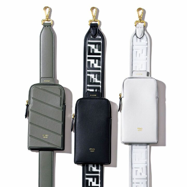 ショルダーストラップ「ストラップ ユー」カーフのカーキ￥99,000・PVCの黒・白各￥87,000【すべてポケット部：縦17.5×横10cm】（フェンディ ジャパン） [Precious2019年4月号255ページ]