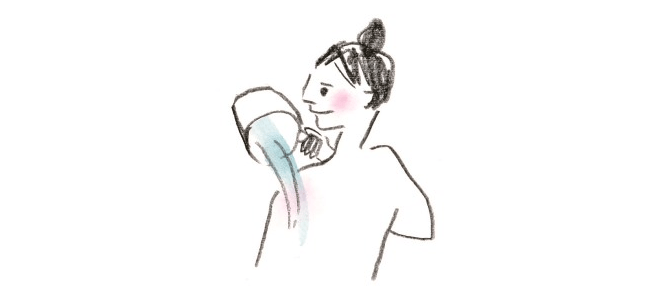 全身に湯をかける