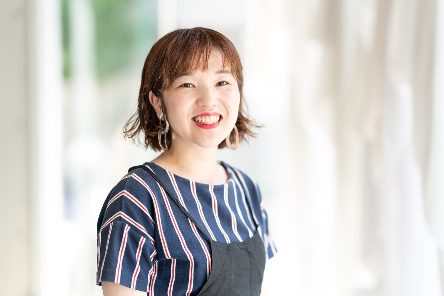 Rougyヘアデザイナー・二階堂雪さん。心機一転を狙って引っ越しをしたばかり。「近くに公園がありすごく環境がいいんですよ」