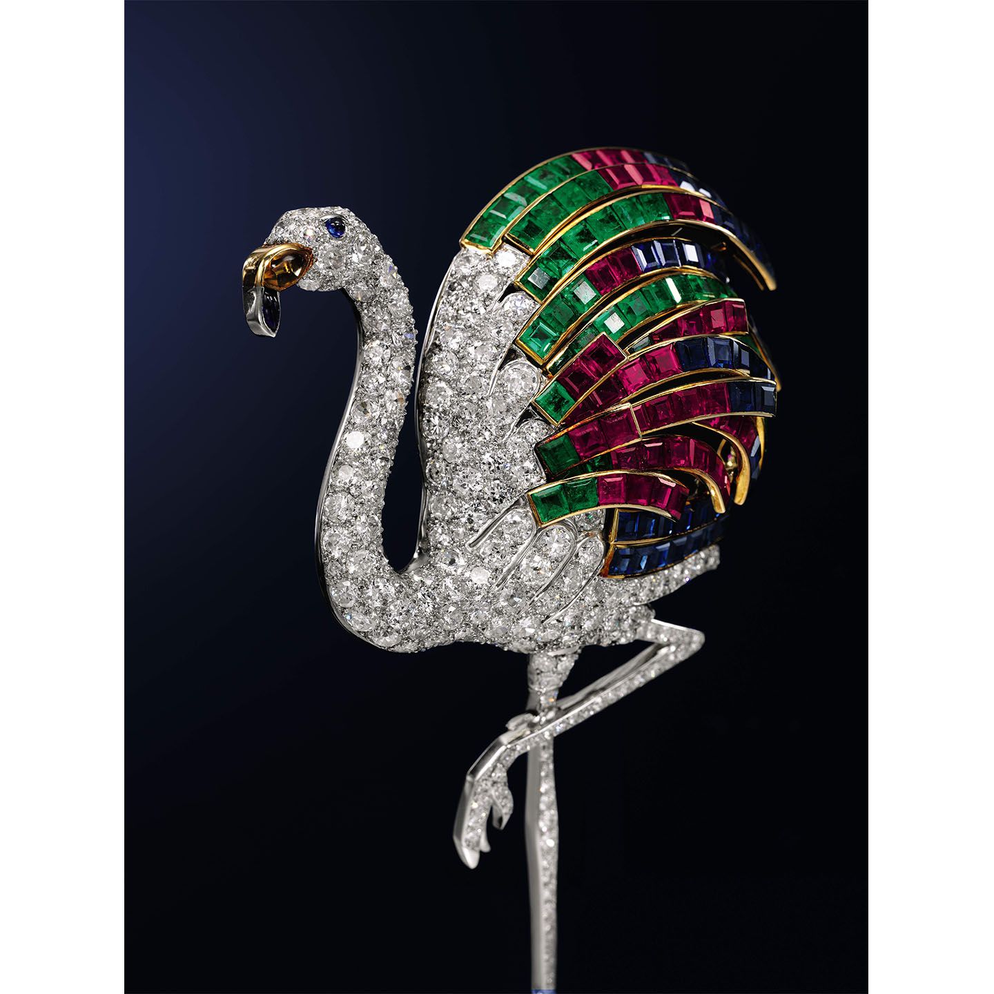 ウィンザー公爵夫人着用のペンダント。「Flamingo Clip」(Cartier)落札価格:1,721,250GBP(英ポンド)【ルビー×サファイア×エメラルド×シトリン×ダイヤモンド】(参考価格:日本円で¥222,763,175 1英ポンド129.42円計算/2019年9月4日レート)