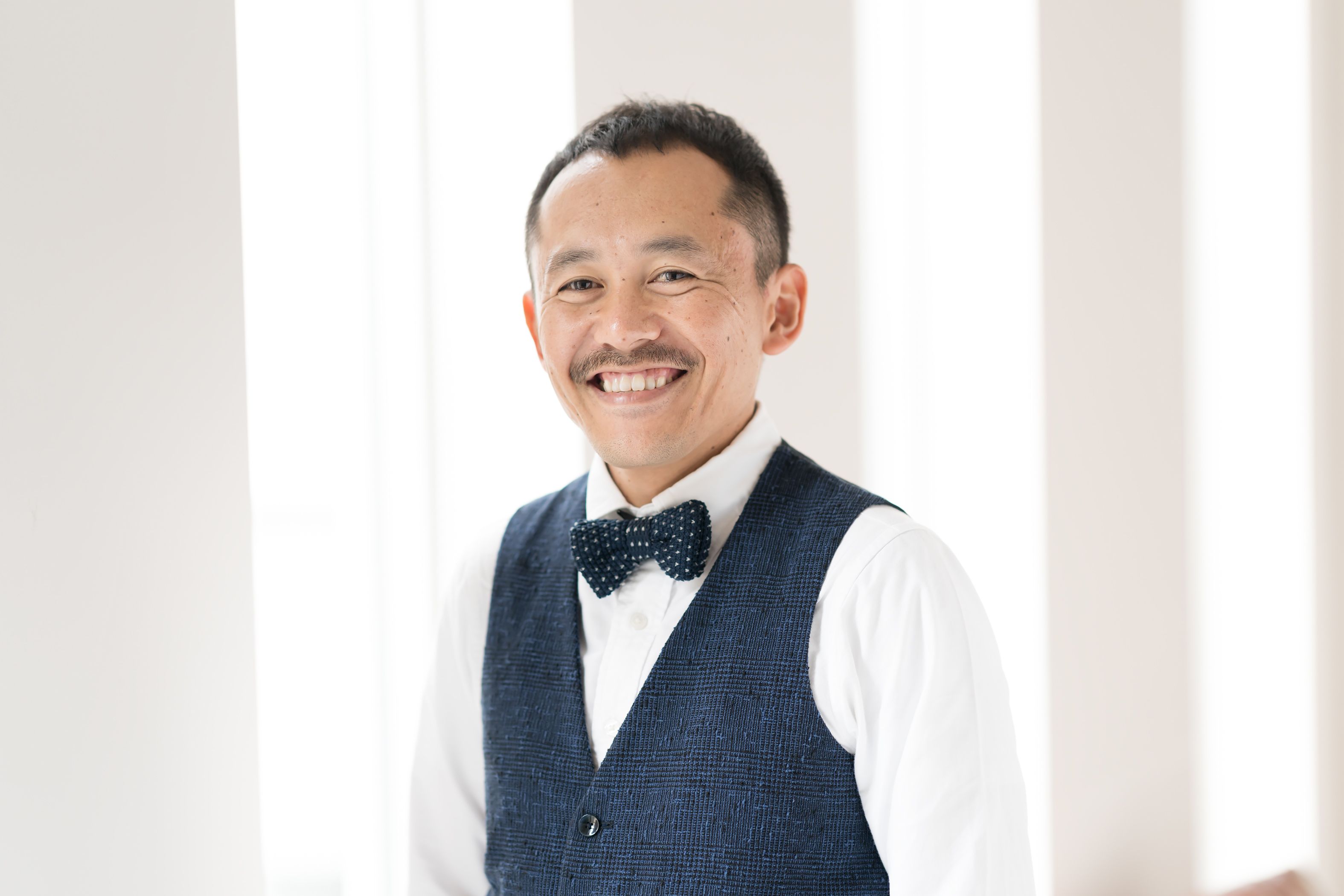FIX-UP OMOTESANDO 店長 宇賀治 智さん。「和洋を問わず甘い物が大好き。死んだときは原宿の老舗・瑞穂の豆大福で棺桶を埋めてほしい!」