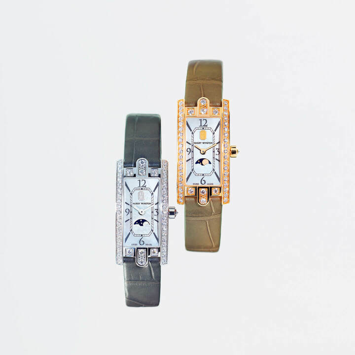 『HW アヴェニューCミニ・ムーンフェイズ』左／￥2,350,000［ダイヤモンド×マザーオブパール×ホワイトゴールド、ケースサイズW15.6×H32.3㎜ 、クオーツ、アリゲーターストラップ］・右／￥2,200,000［ダイヤモンド×マザーオブパール×ローズゴールド、同］