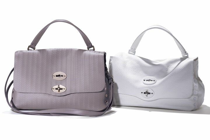 左から／グレージュ色の「ポスティーナ S カシミアブランディーン」￥110,000／ショルダーストラップ付き【縦19×横29×マチ15cm】・ホワイトの「ポスティーナ S プーラ」￥85,000／ショルダーストラップ付き【縦19×横29×マチ15cm】（アマン〈ザネラート〉）　[Precious2018年11月号346ページ]